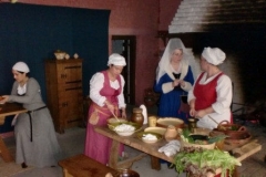 The lady gives her orders to the working women